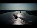 Over Cafe Du Monde, Mississippi River And Jackson Square In Downtown New Orleans (4K Drone)