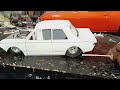 1/12th scale 68 Ford cortina or Datsun 510