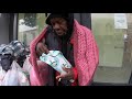 Giving Christmas Gifts To The Homeless