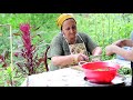 Grandma Cooking Khinkal with Homemade Chicken and Dovga with herbs from her garden