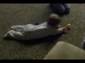 Evea teaching Max to crawl