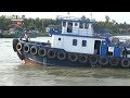 [541] The power of the two tugboats towing the giant barge through the dam gate is very strong
