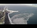 Video shows ice breaking away from Lake Michigan after deep freeze