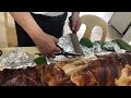 Cutting 40kg roasted pig