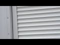 Automatic rolling shutters for a warehouse