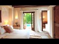 Rustic Mediterranean Luxury Unveiled: Bedroom Connected to Pool Courtyard